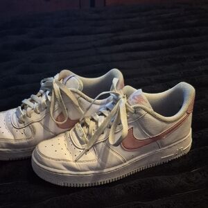 Nike Women's White Sneakers with Pink Swoosh - Classic Low Top